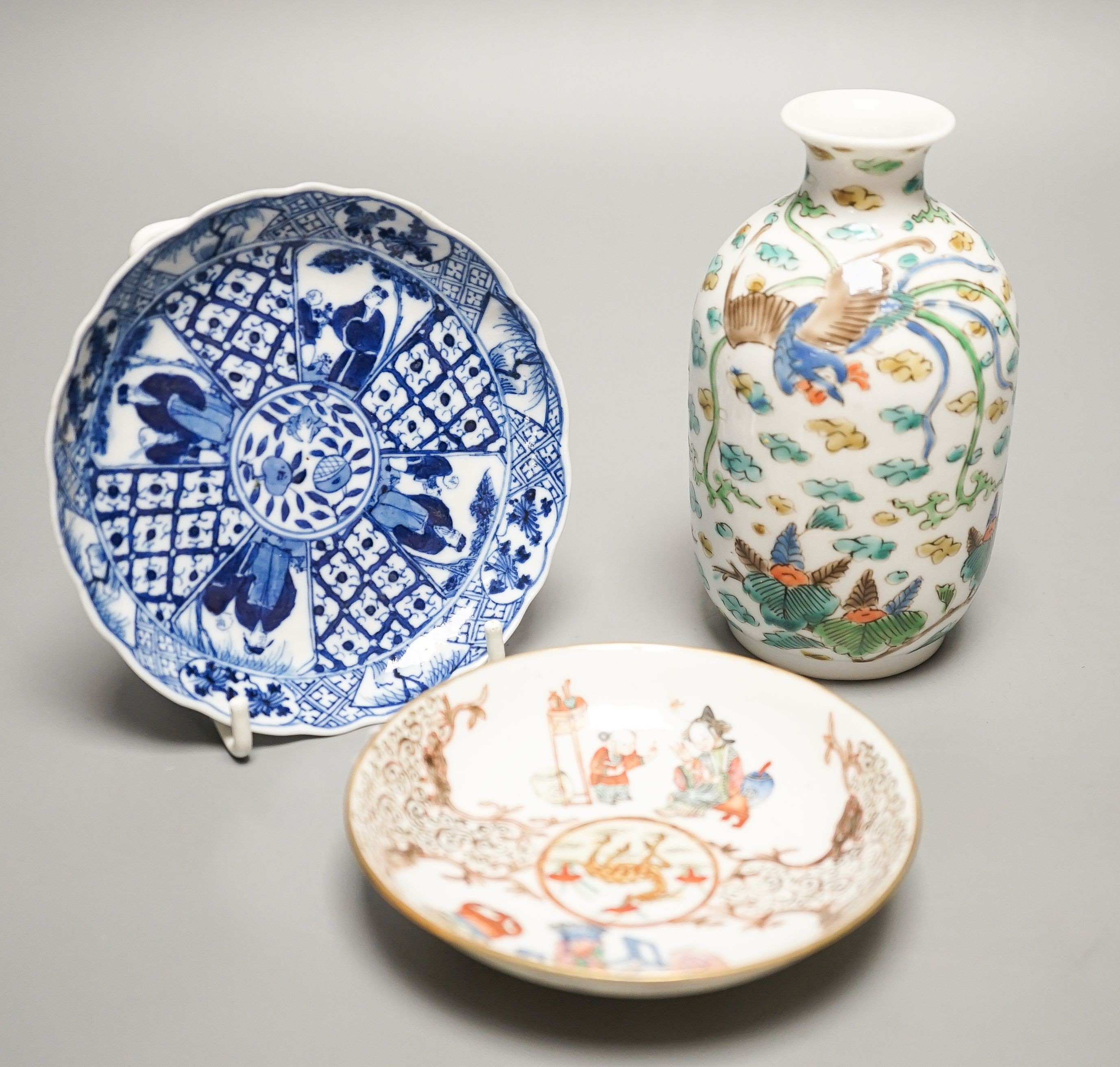 Two Chinese porcelain saucer dishes and an enamelled porcelain vase, 18th century and later, 12.5cm